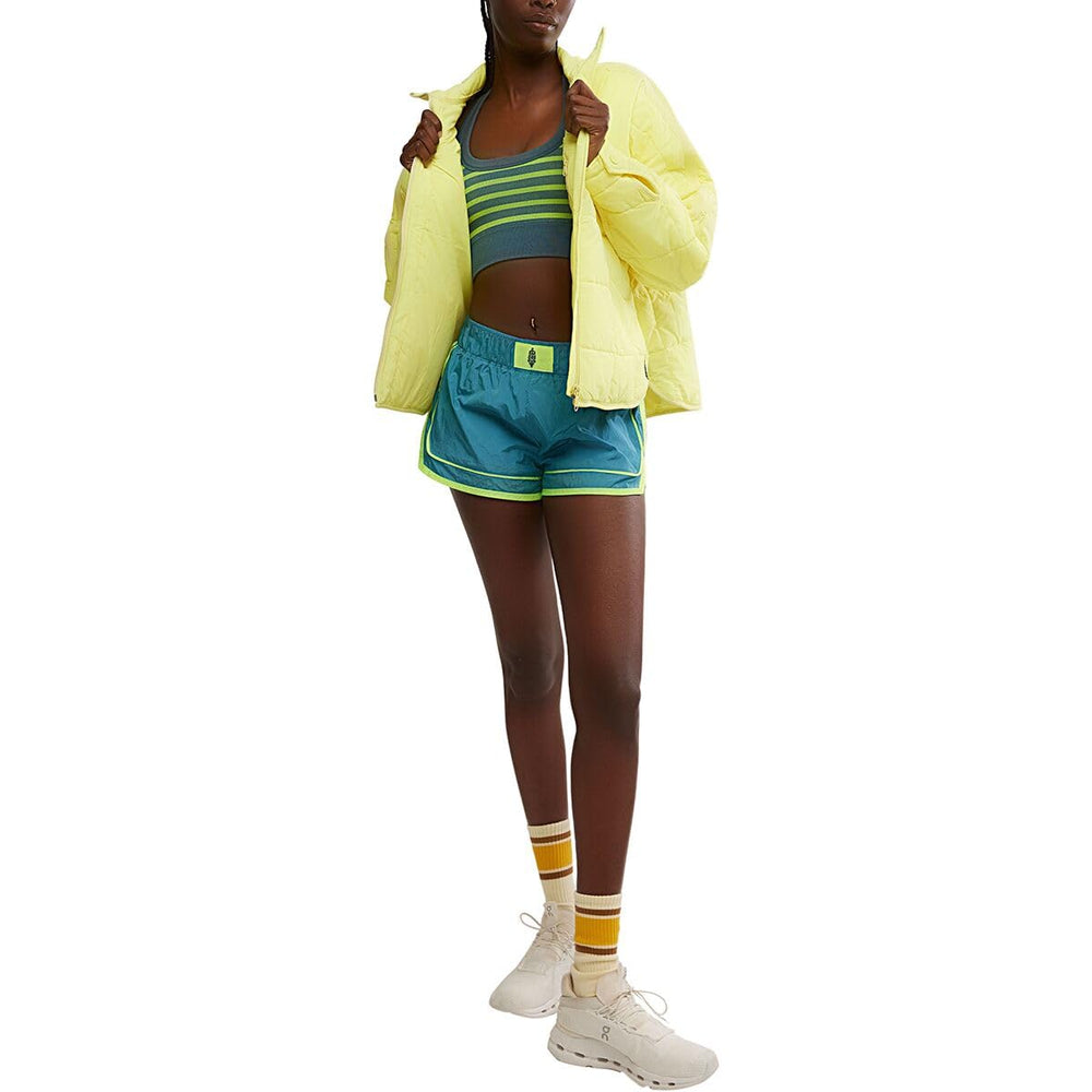 Free People Pippa packable puffer jac side pose demonstrates fitted silhouette and easy layering.