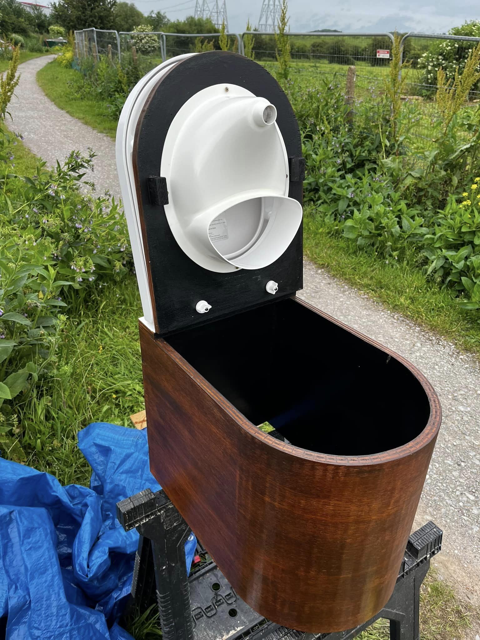 Free Range Designs universal-fit diverter under-seat setup suits cabins, vans, boats, and tiny homes.