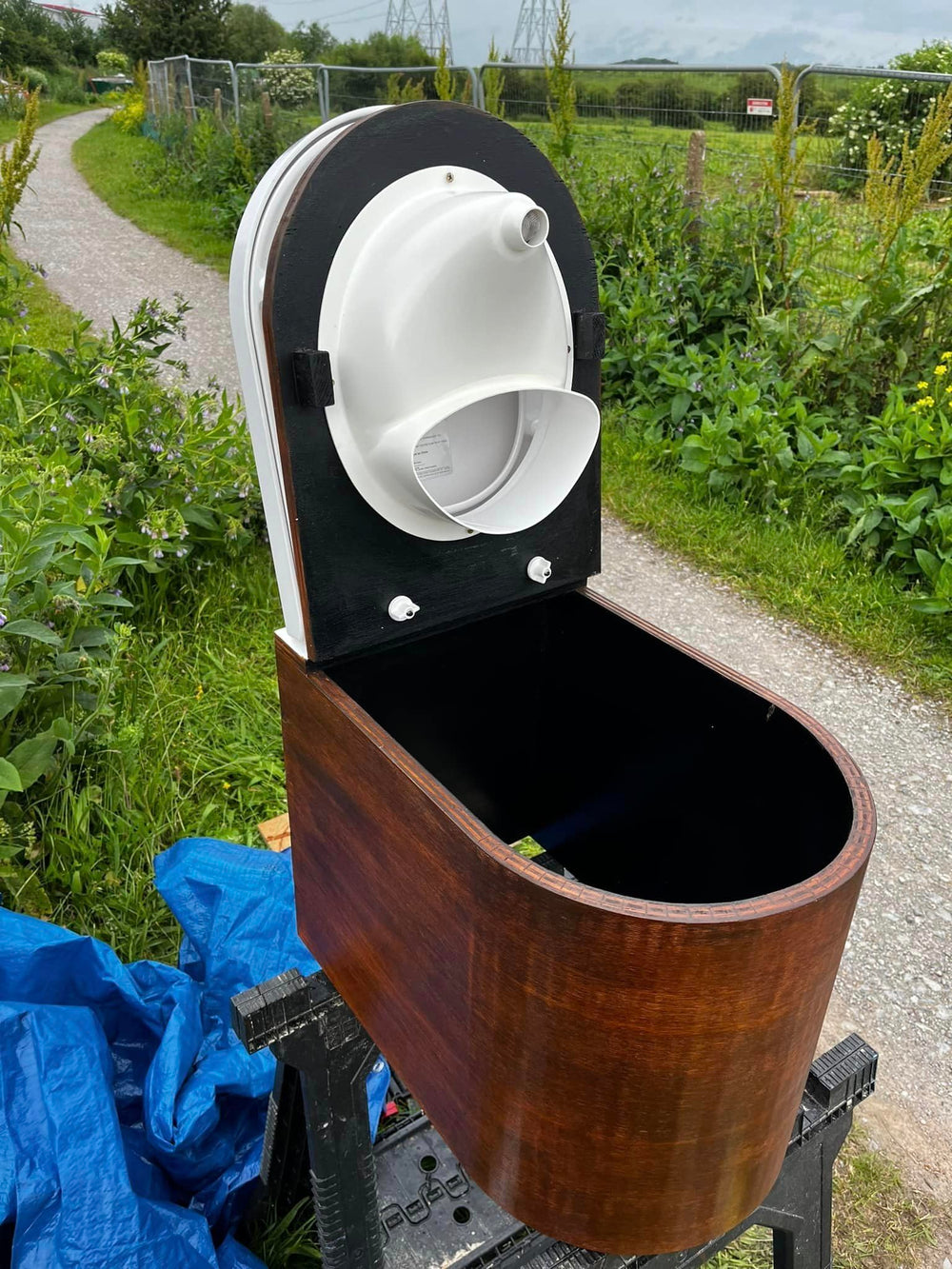 Free Range Designs universal-fit diverter under-seat setup suits cabins, vans, boats, and tiny homes.