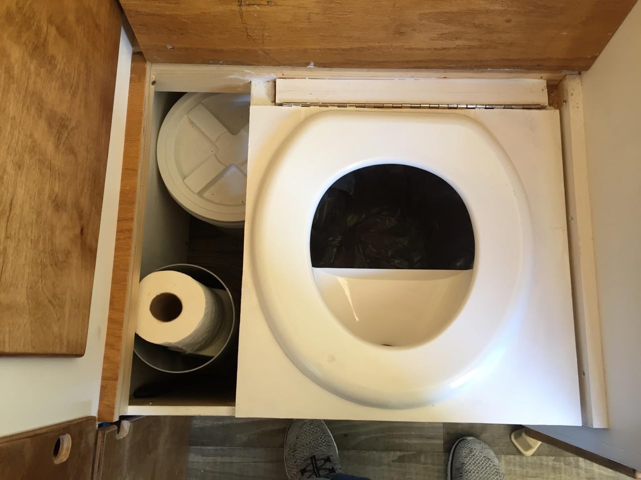 Free Range Designs urine separator white-and-black finish shows versatile bathroom styling.