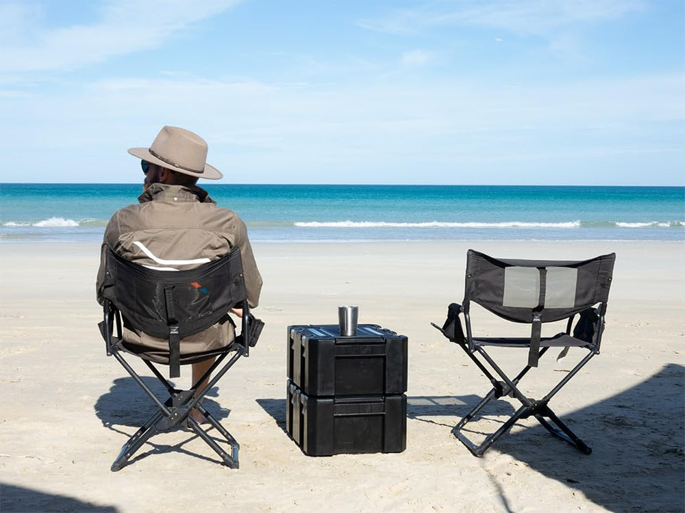 Front Runner Expander Chair setup at a barbecue or outdoor event