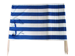 Frost Hats 13 ft beach windscreen in blue and white stripes shielding your shade area from wind