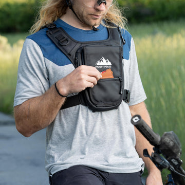 Frosty Peaks chest rig black phone pouch close-up for quick maps and photos.