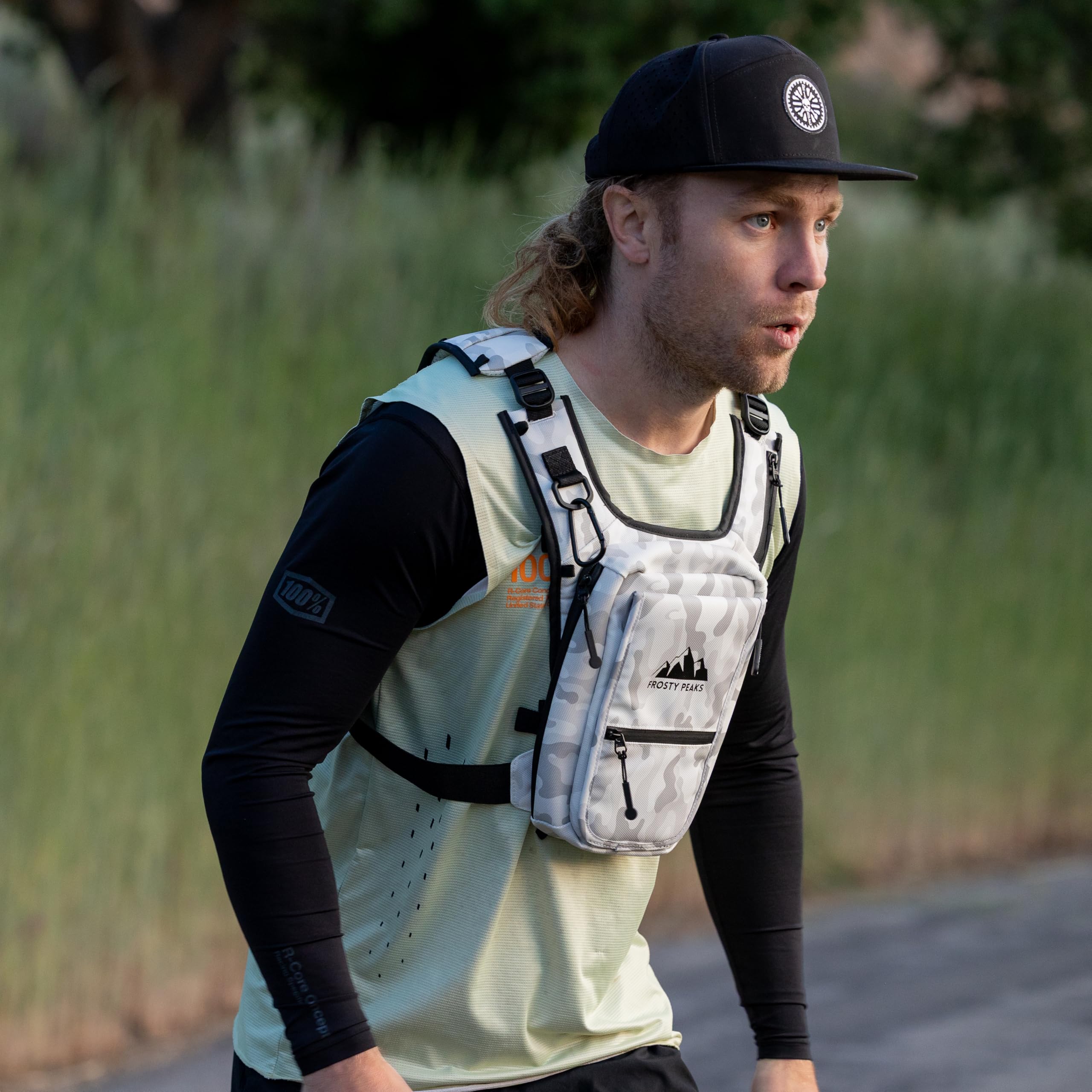 FROSTY PEAKS Ride Pack dual-side pockets organize gear for outdoor runs