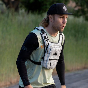 FROSTY PEAKS Ride Pack dual-side pockets organize gear for outdoor runs