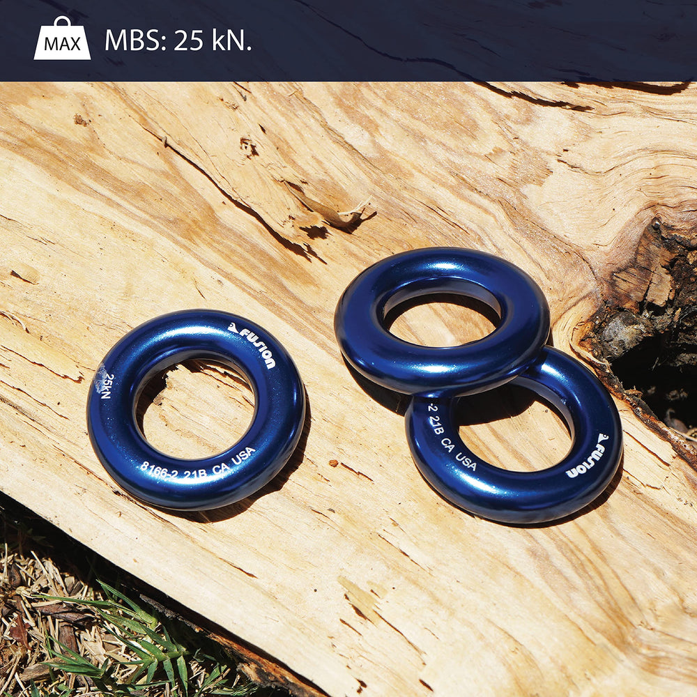 Fusion Climb small 2-inch rings connected to a belay anchor during training.