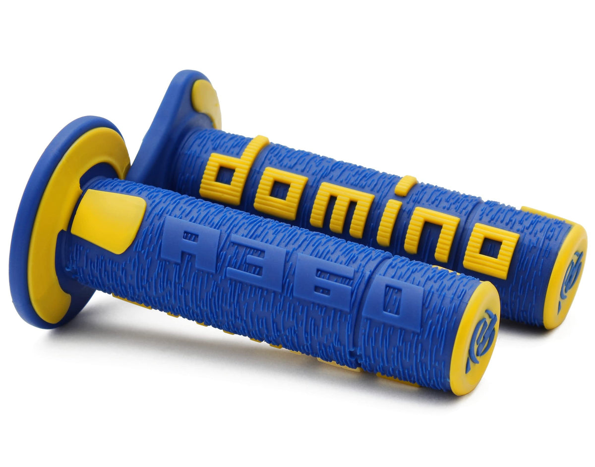 G2 Ergonomics Domino A360 dirt bike grips in blue and yellow improve grip and on-trail visibility.