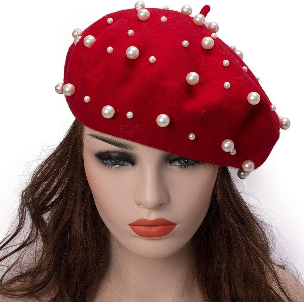 Close-up of faux pearl beads on wool beret