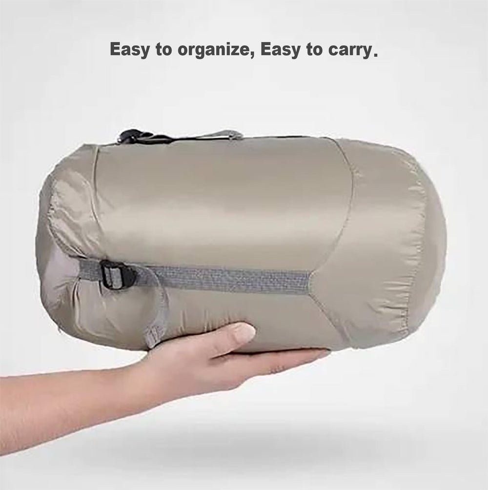 Gaorui ultralight poncho folded beside the storage bag for easy packing.
