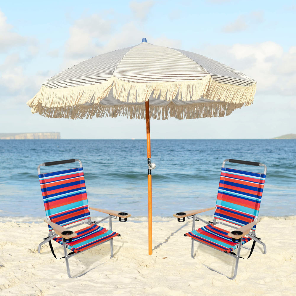 Garden Elements beach chairs show built-in cupholders for drinks by the shore.