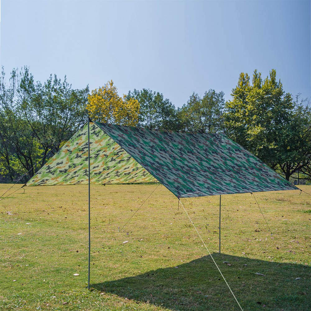 Gavigain camo bushcraft tarp portable setup goes anywhere for quick shelter.