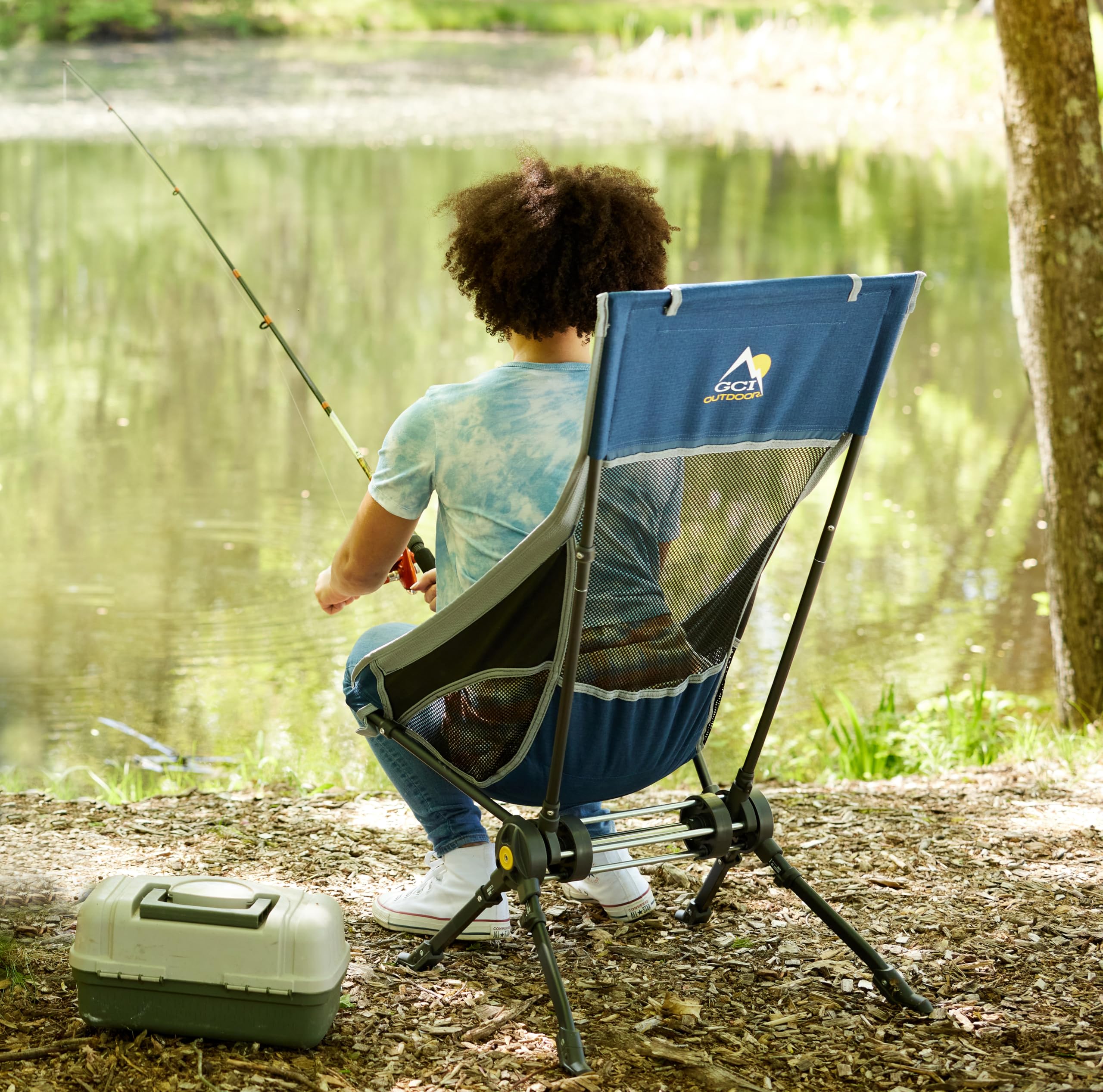 GCI Outdoor Compack Rocker shows rotation technology for steady rocking on varied terrain.