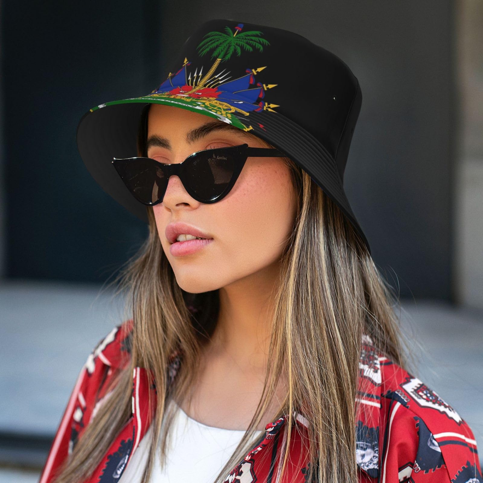 GDUUASB Haiti Flag Pattern Hat worn at the beach for a bold look.