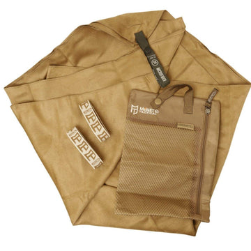 Gear Aid Quick Dry Microfiber Towel Coyote XL folded for compact travel and packing.