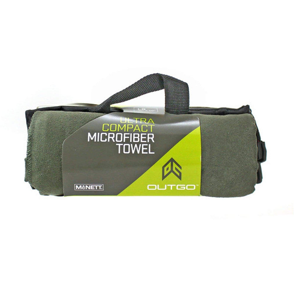 GEAR AID Quick Dry Microfiber Towel in OD Green drying quickly after a swim