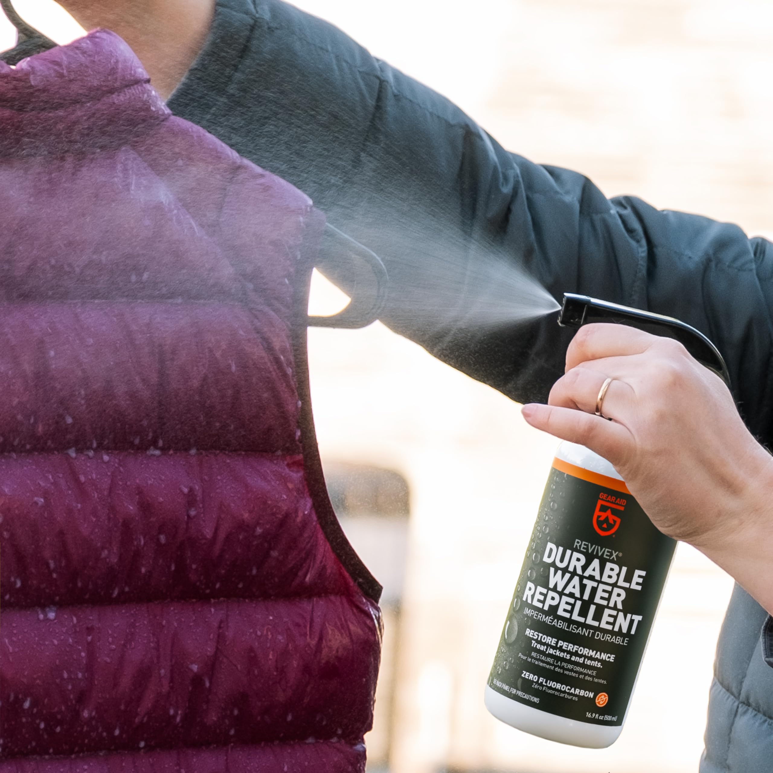 GEAR AID Revivex DWR spray on backpack sheds rain and stains
