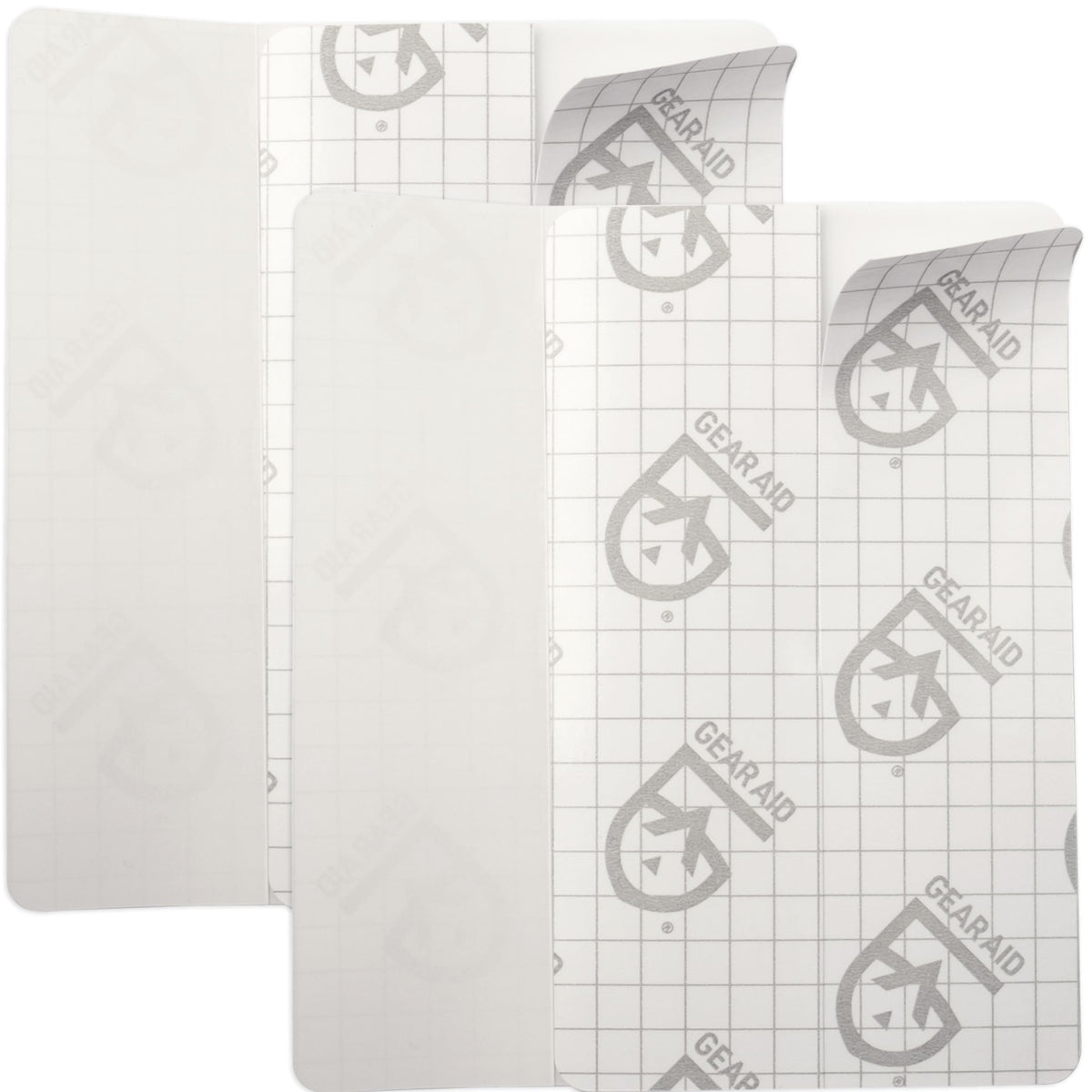 GEAR AID Tenacious Tape Flex patches on a clear surface for near-invisible vinyl repairs
