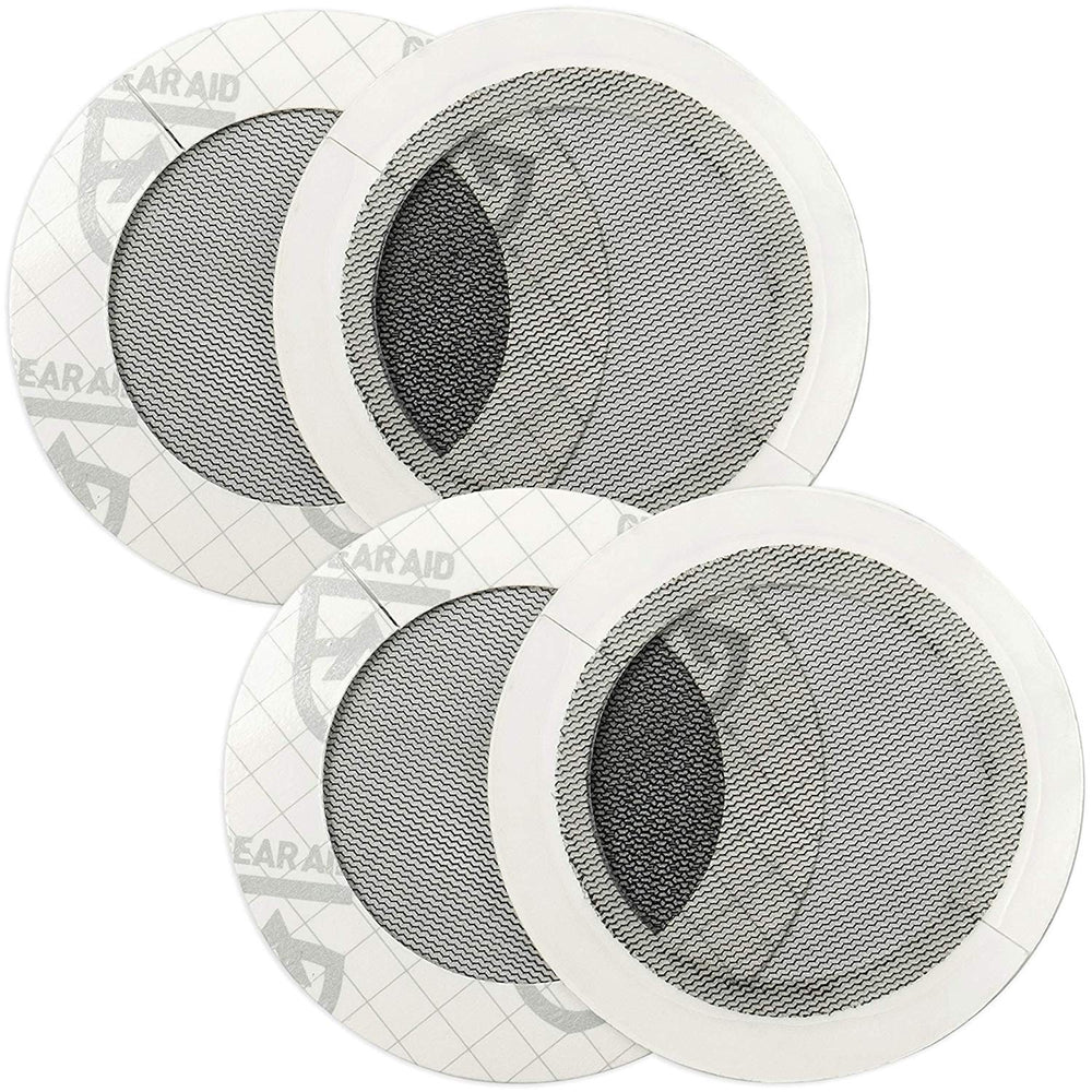 Gear AID Tenacious Tape Mesh Patch covers tent hole for quick campsite repair.