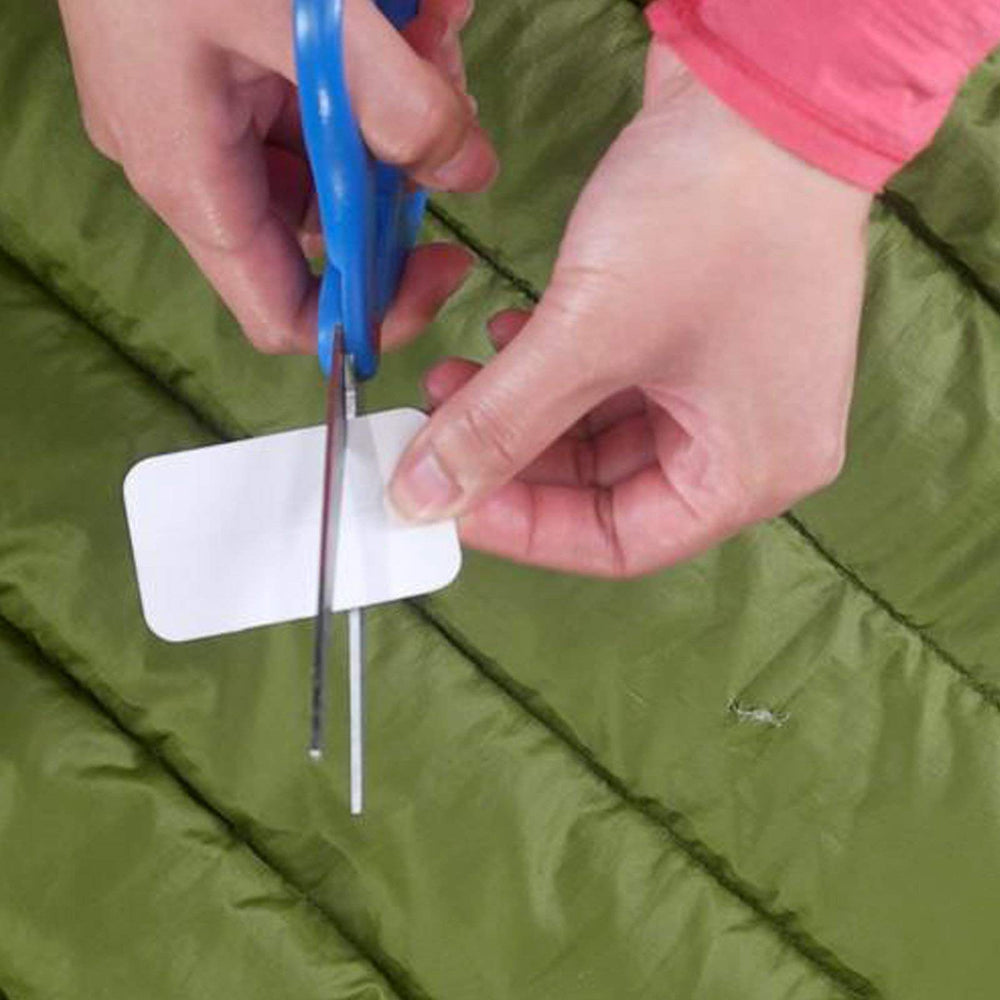 GEAR AID Tenacious Tape Mini Patches black on gear preserves waterproof performance.