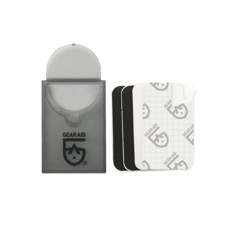 GEAR AID Tenacious Tape Mini Patches on a sleeping bag repair keeps fabric secure.
