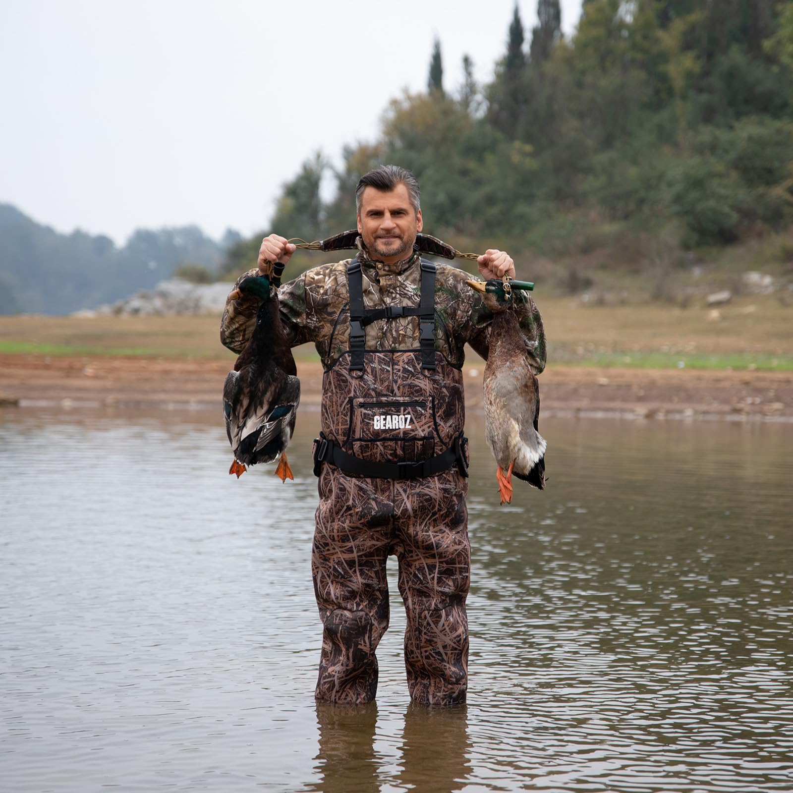 GearOZ neoprene waders with waterproof seams for complete moisture protection.