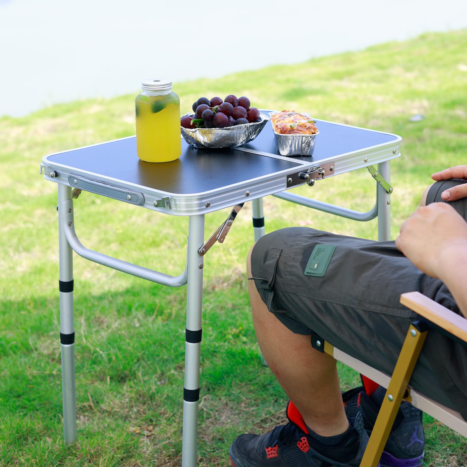 Geastsheng portable camping table picnic-cooking creates a convenient prep surface on the go.