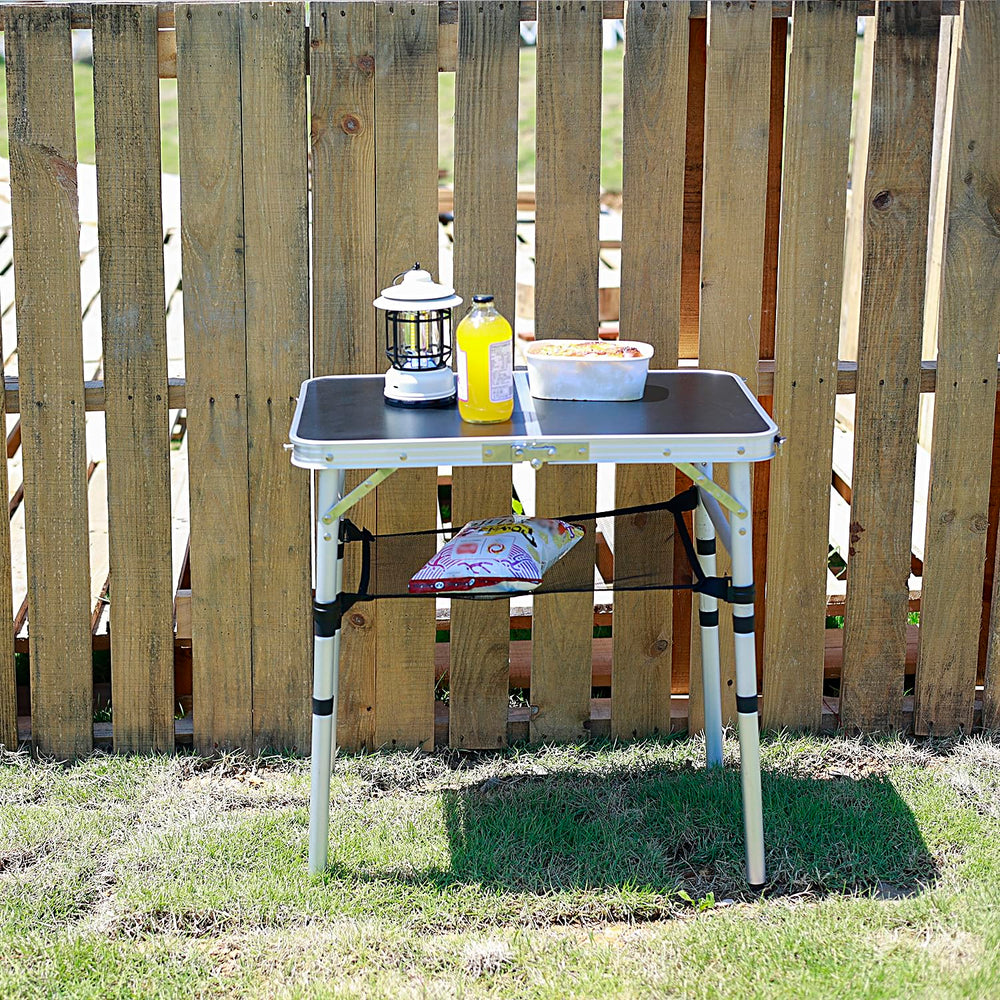 Geastsheng portable camping table waterproof-panel resists stains for easy cleanup on picnics.