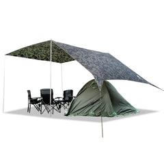 Geertop large hammock rain fly shelter spread over campsite offering expansive coverage for tents and hammocks