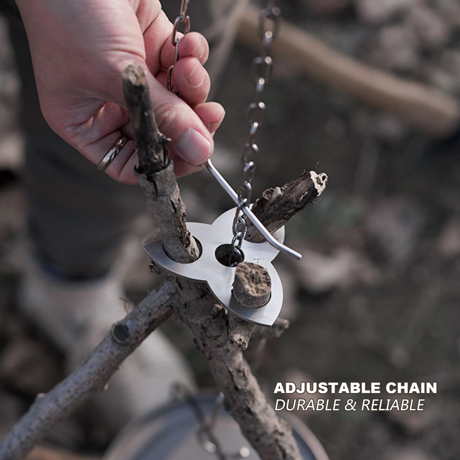 Generic campfire tripod setup with branches and adjustable height for cooking.