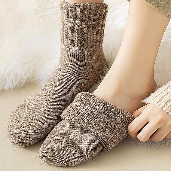 Generic durable mid-calf socks on foot highlighting comfortable stretch for most sizes.
