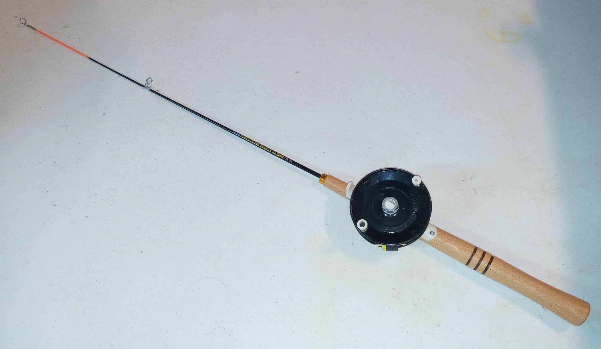 Generic ice fishing jig pole compatible with Douglas Creek tip-down for easy setup.