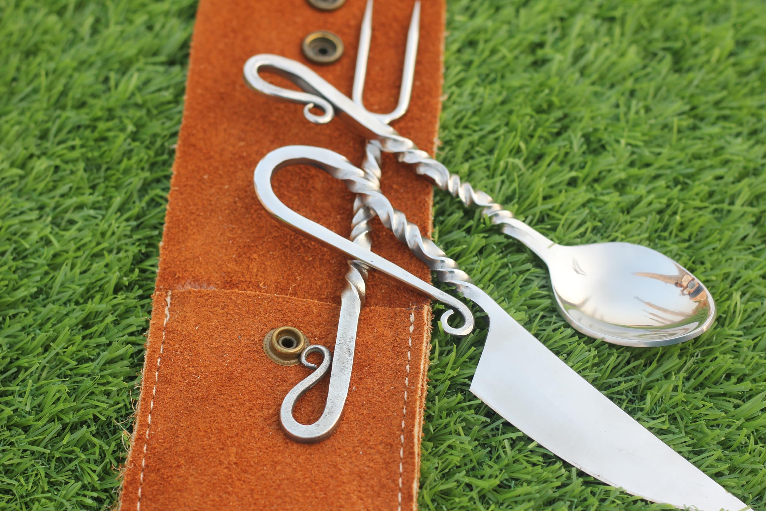 Leather pouch keeps cutlery organized for outdoors.