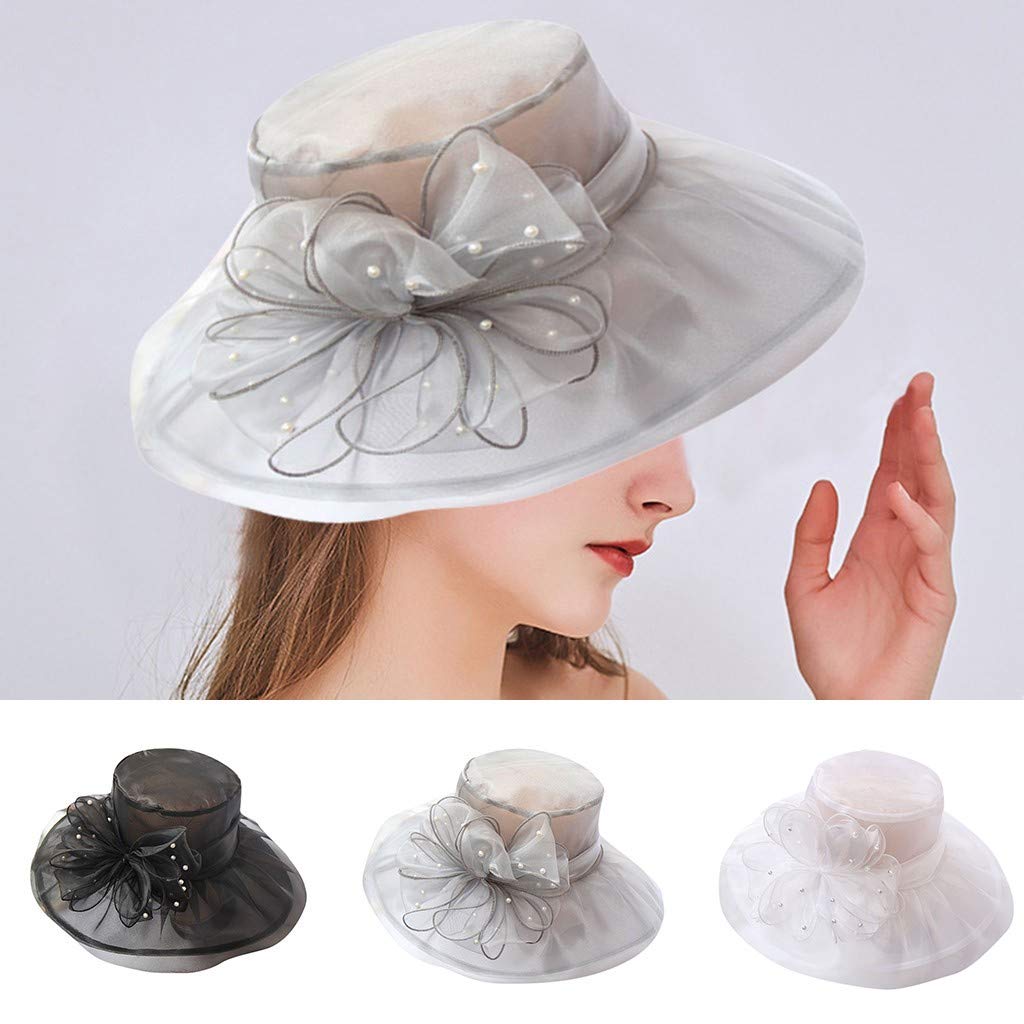 Generic Tea Party Hat with wide brim in purple organza for stylish events.