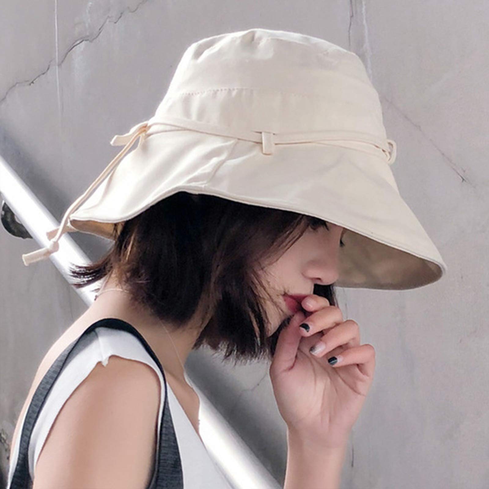 Packable foldable cotton hat fitting easily into a travel bag