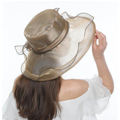 Elegant organza fascinator, Kentucky Derby style, beige shade for outdoor celebrations.