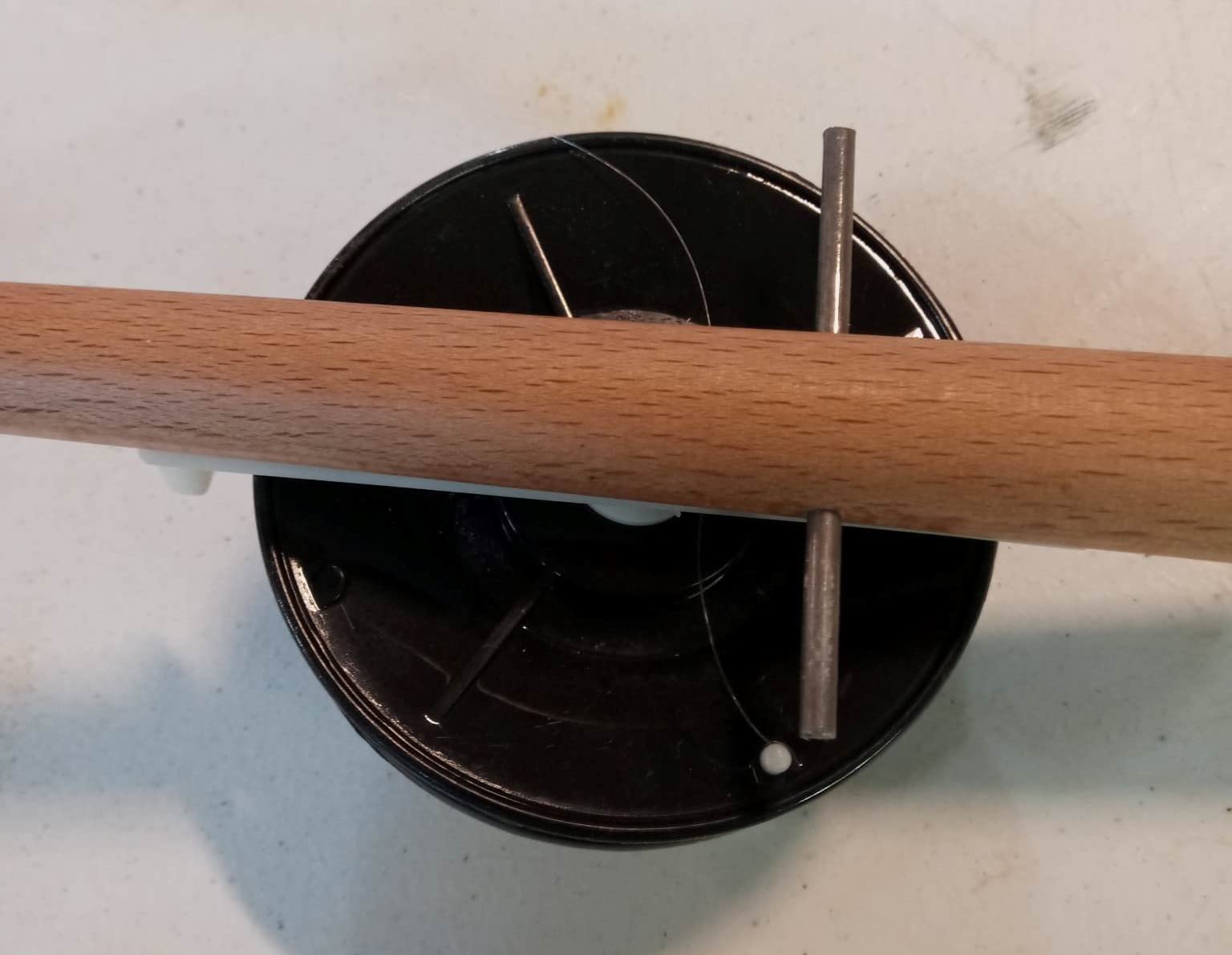 Generic 29-inch rod with varnished wood handle and orange tip for visibility.