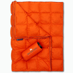 Get Out Gear Down Camping Blanket in its stuff sack for portable trail storage.