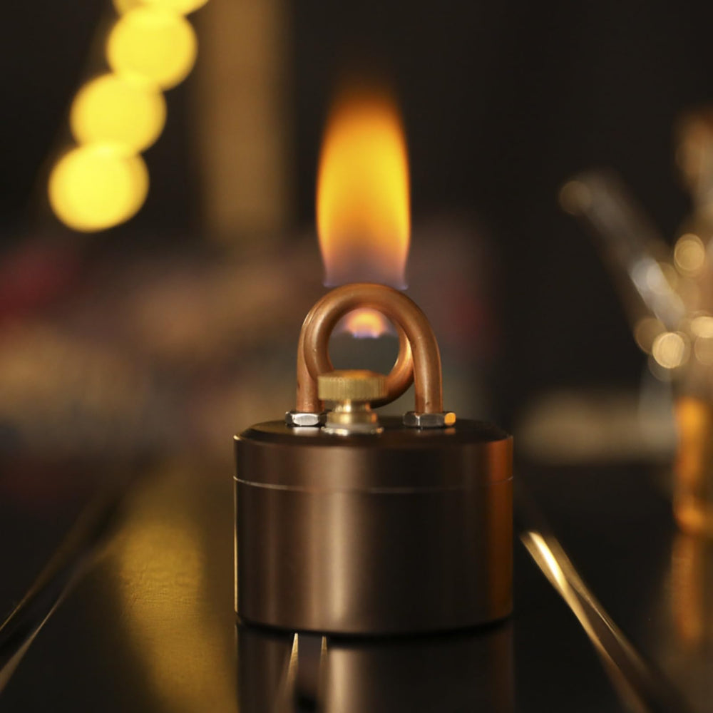 Gexdes portable mini alcohol stove folding stand close-up highlights easy setup on uneven terrain