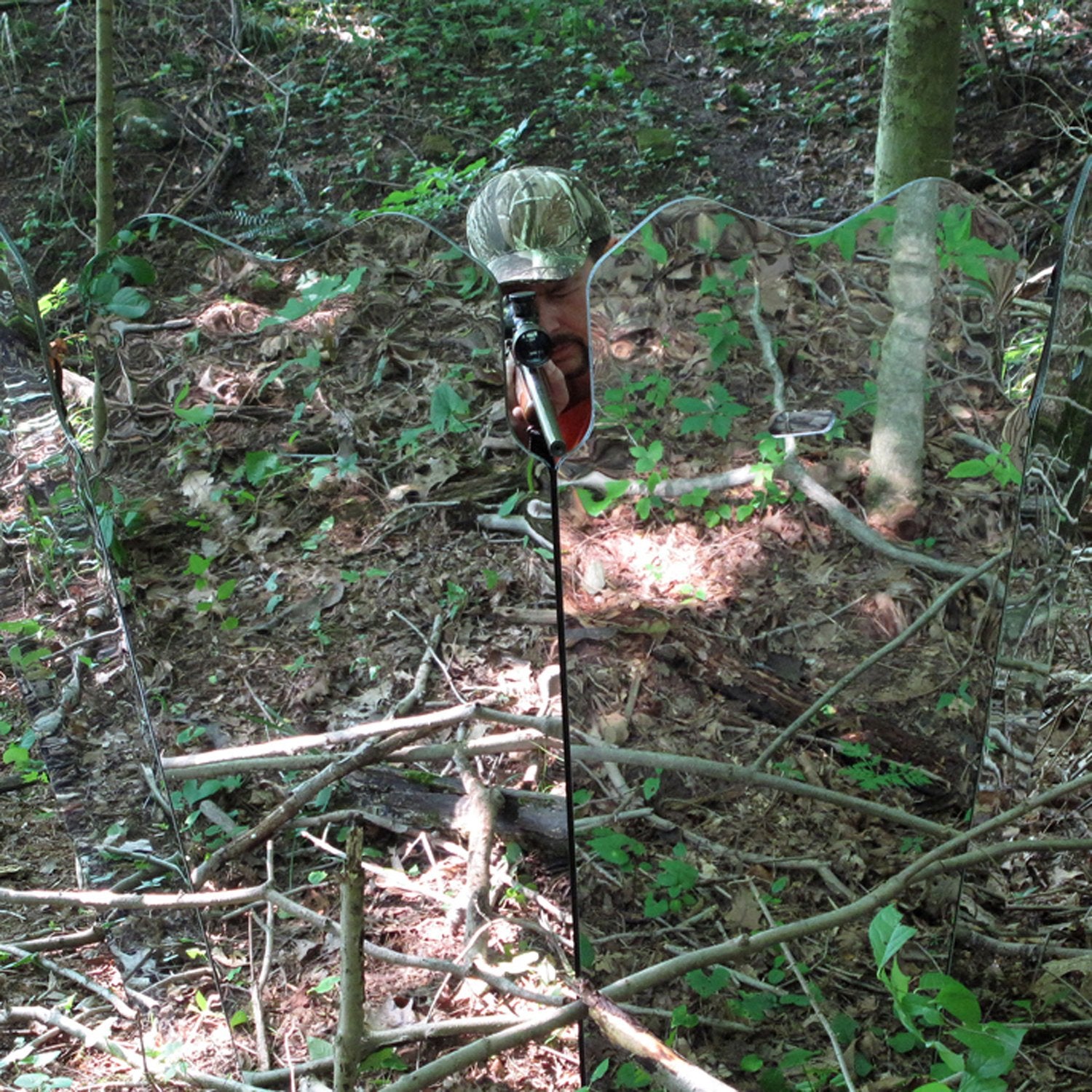 Woodland camouflage pattern of GhostBlind blends with surroundings during hunt.