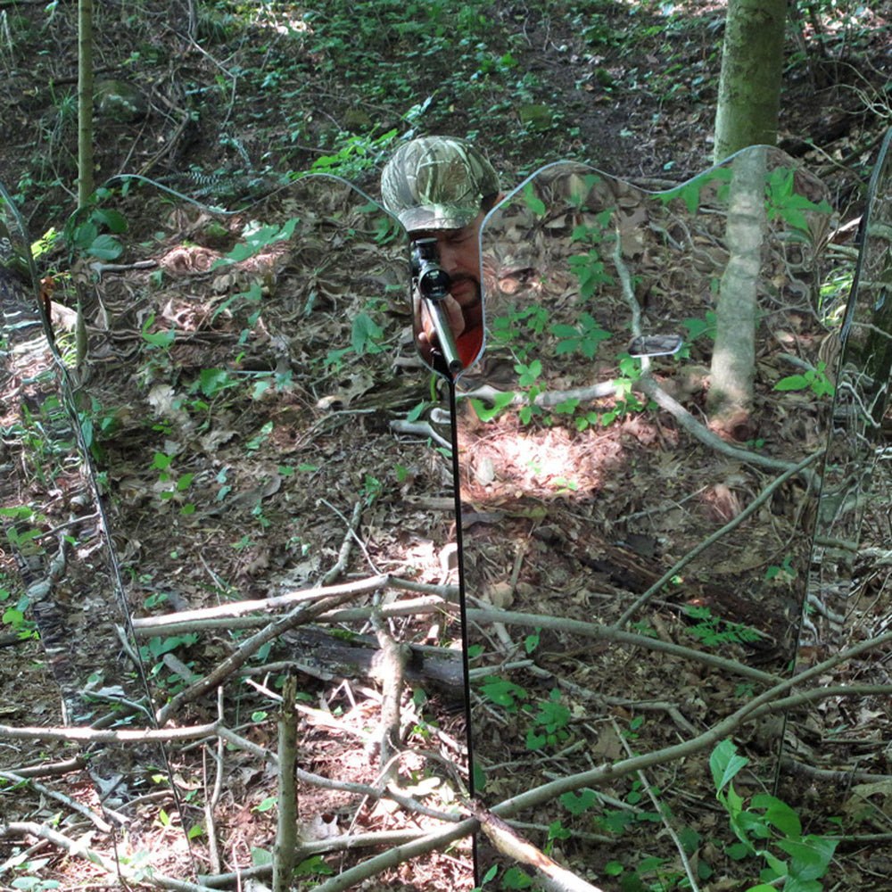 Woodland camouflage pattern of GhostBlind blends with surroundings during hunt.