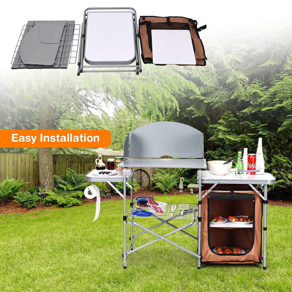 Giantex foldable camping kitchen table shows durable steel frame on site.