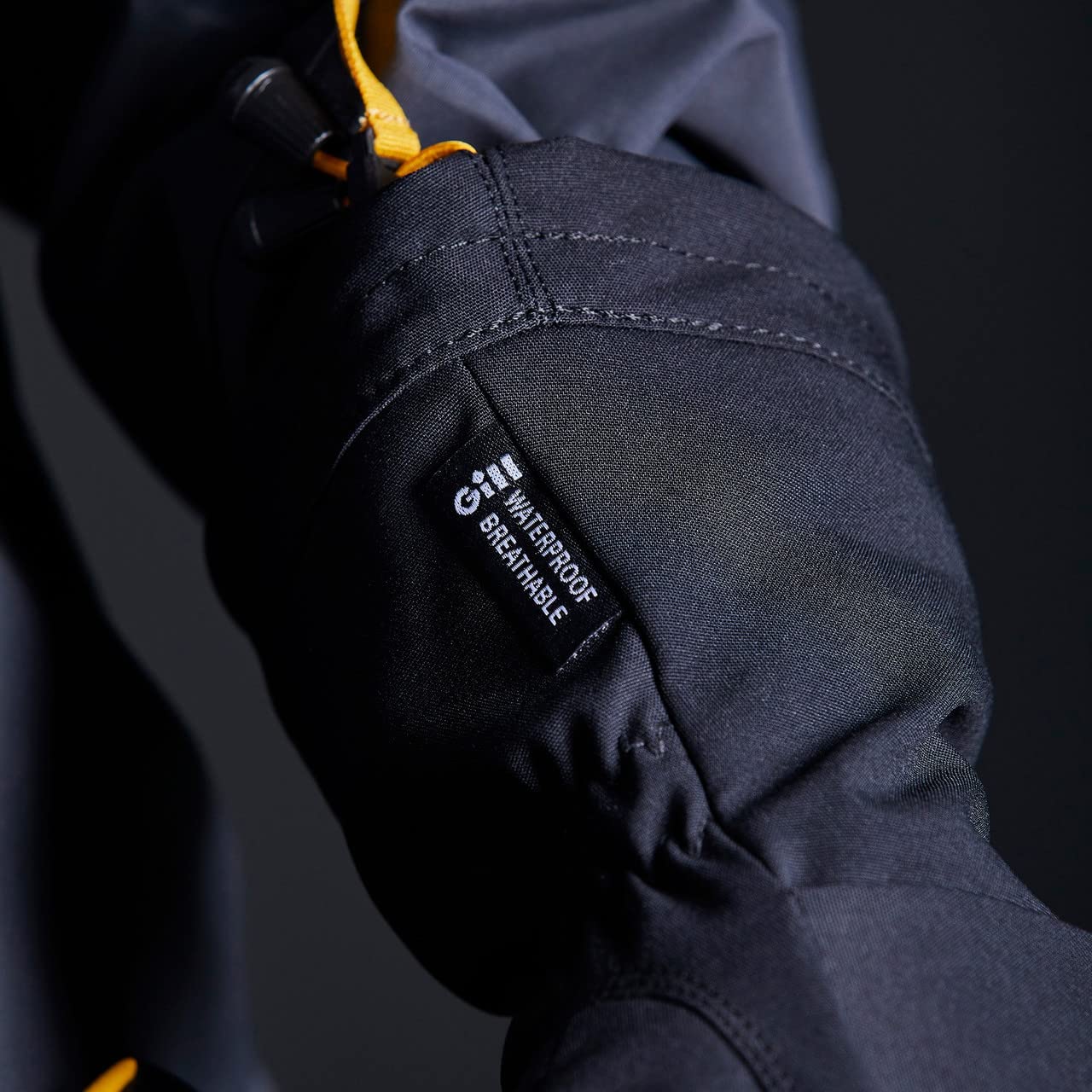 Gill Helmsman elastic cuff and drawcord secure fit.