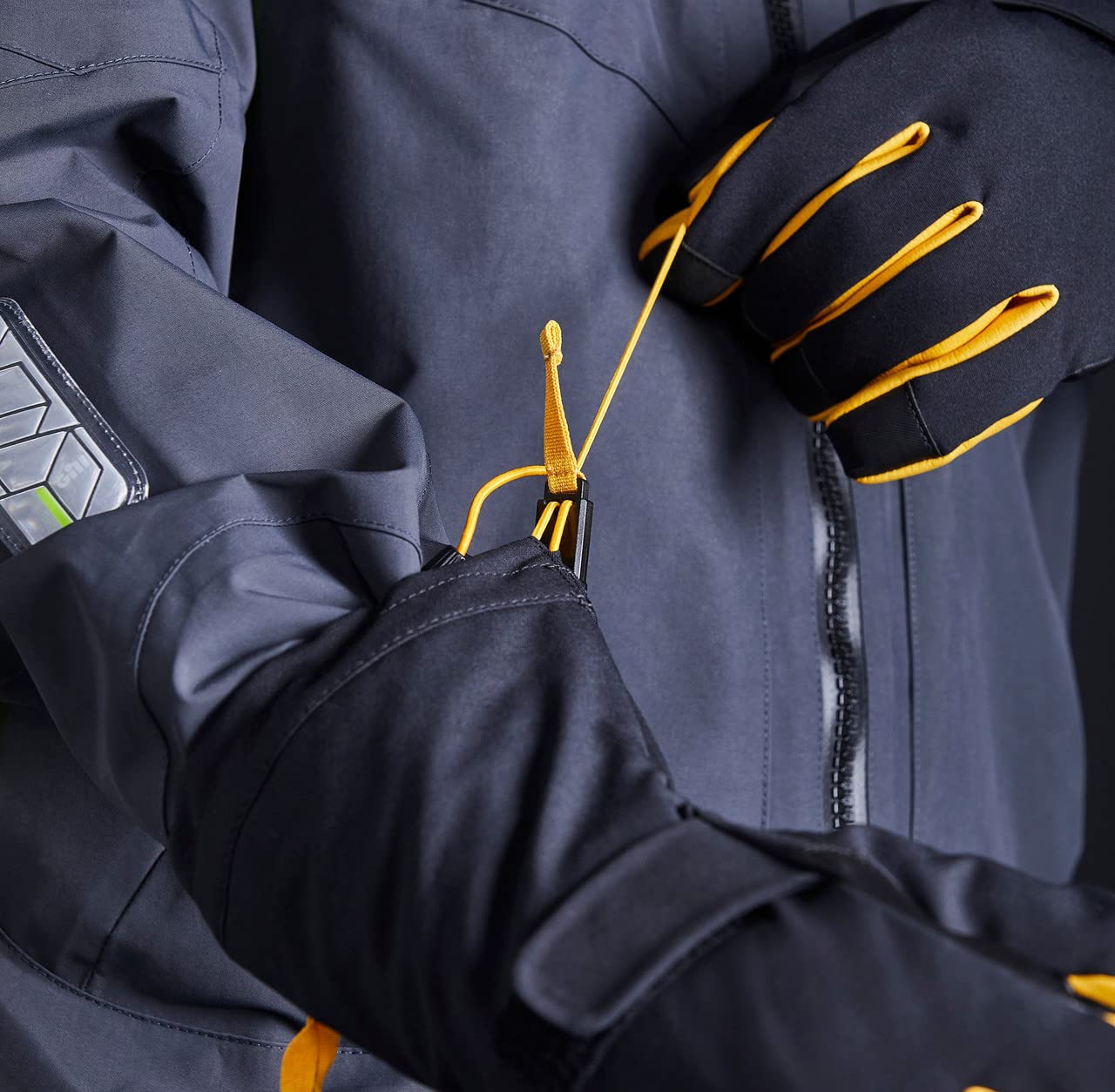 Gill Helmsman extended gauntlet fits under outer layers.