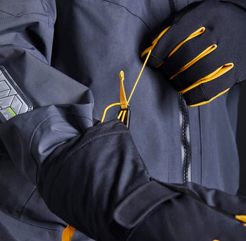 Gill Helmsman extended gauntlet fits under outer layers.