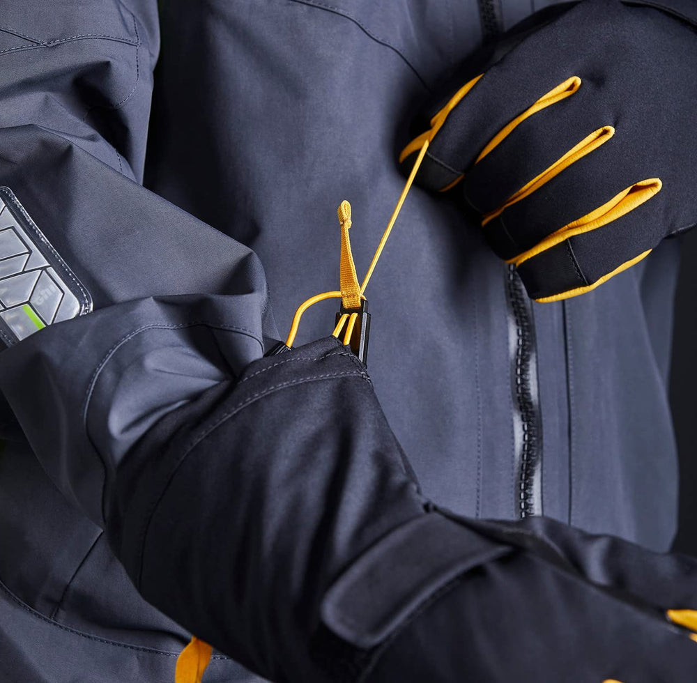 Gill Helmsman extended gauntlet fits under outer layers.