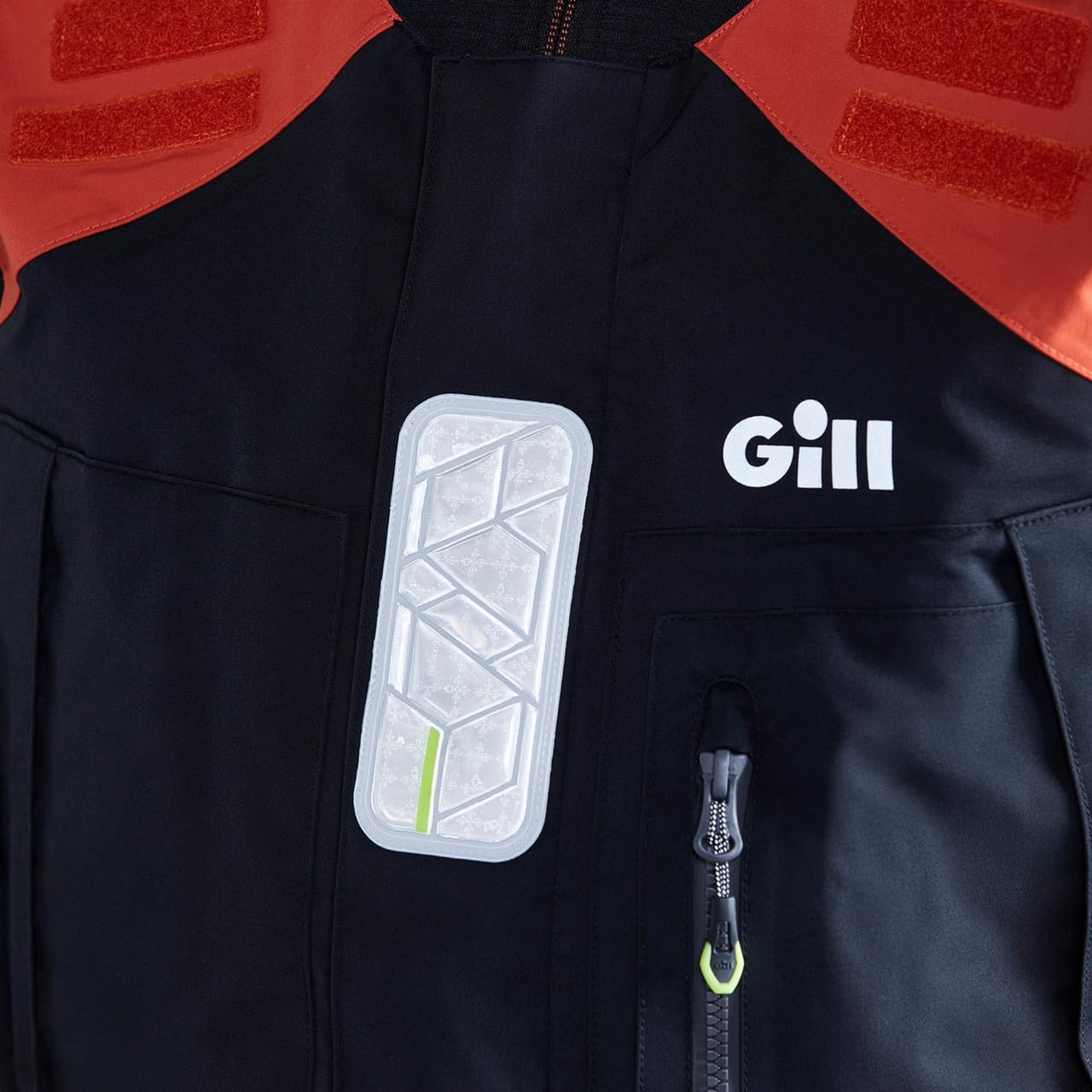 Gill OS1 XPLORE+ fabric detail shows water repellence on spray days.