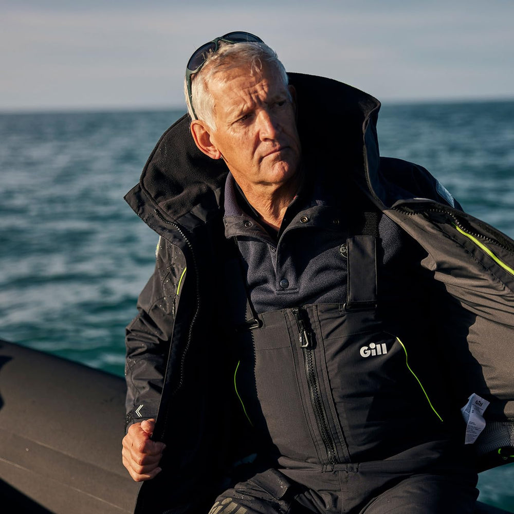 Gill OS2 offshore trouser in action at sea with gear attached for versatile sailing