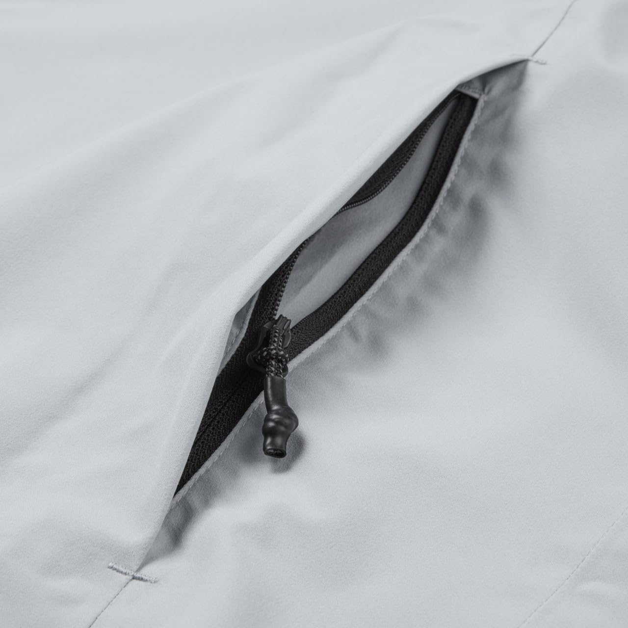 Gill Voyager Rain Jacket zipper detail highlights reverse-coil zip with internal storm guard.
