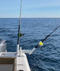 Glide Gear 1X dual offset spreader rod holder on a boat extends trolling spread