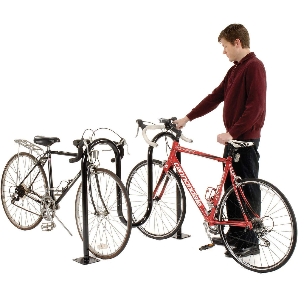 Global Industrial 41-inch Wave Bike Rack in-store setting for neat parking